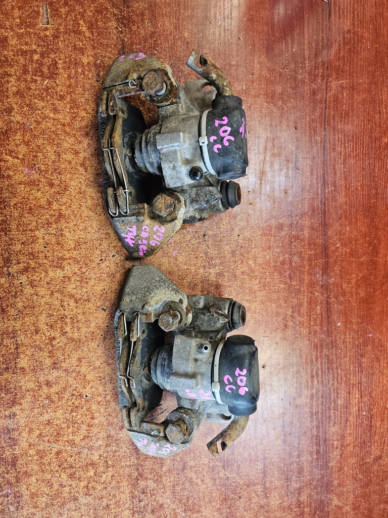 фото №1, Супорт лівий правий задня peugeot 206 cc 01'