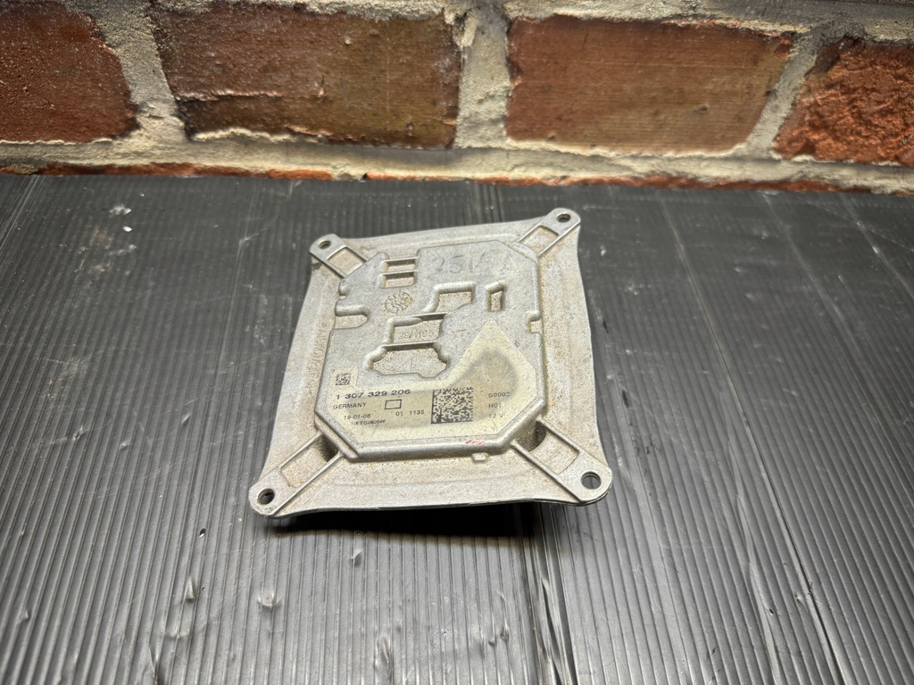 фото №1, Преобразователь audi оригинальный номер 1307329206