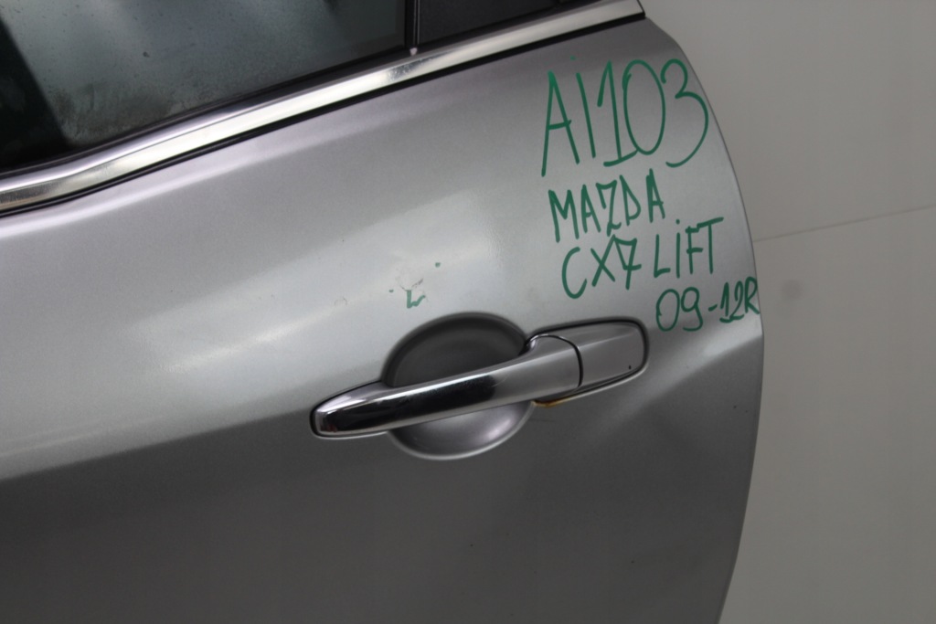 Дверь левое  задняя mazda cx7 09-12r рестайлинг  38p с Разборки
