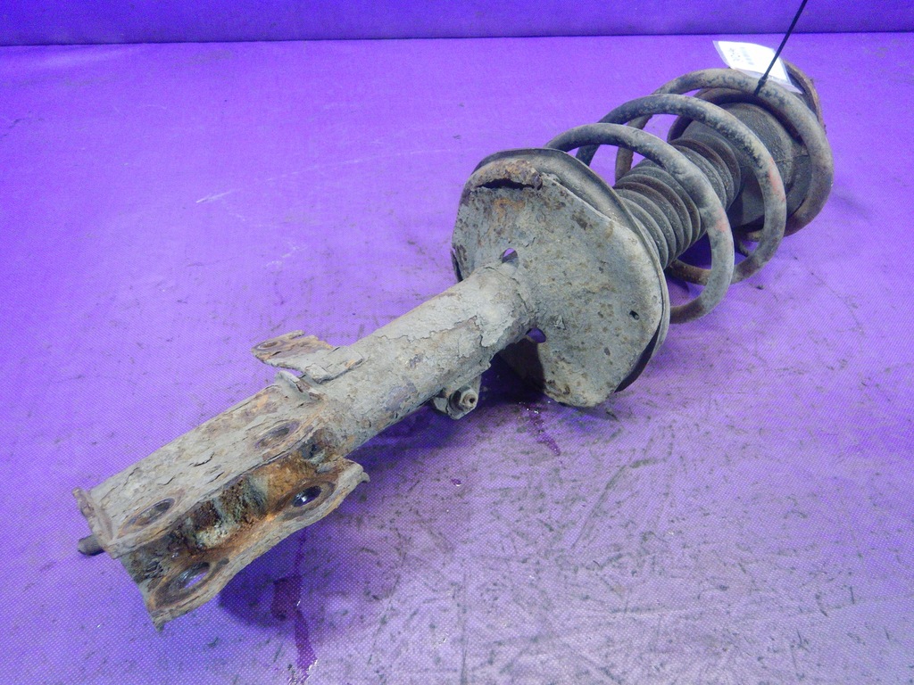 фото №1, Corolla e12 1.2 амортизатор mcperson перед левый