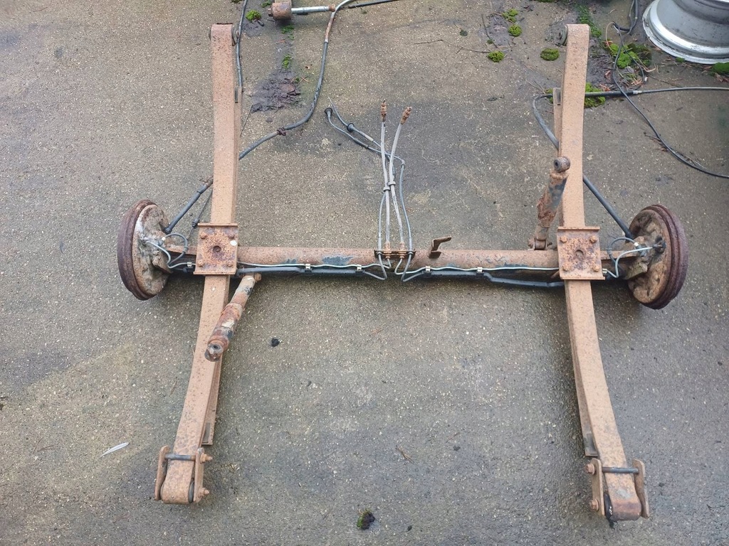 фото №1, Oś балка подвеска задняя + рессоры idealna na przyczepkę