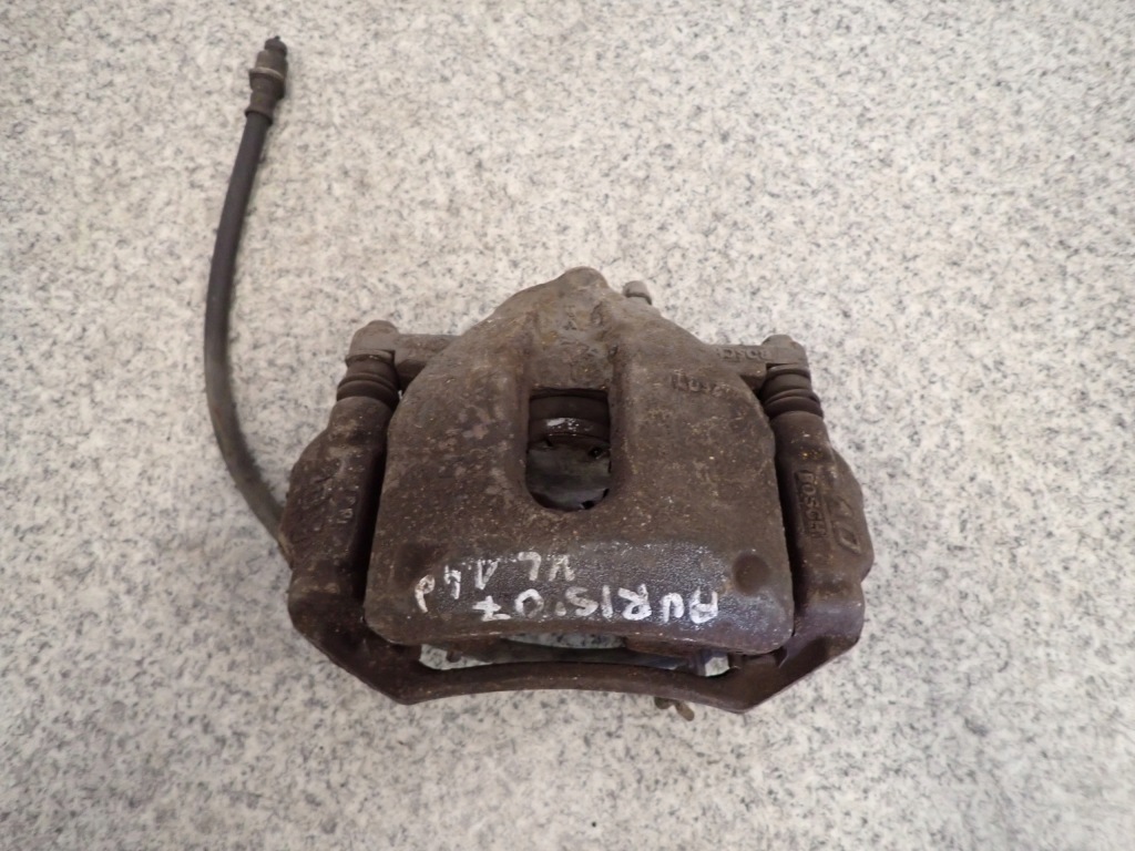 фото №1, Toyota auris 06-12 суппорт передний левый