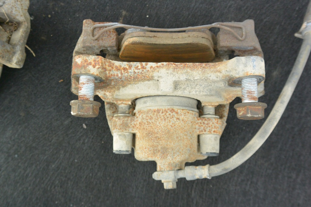 фото №7, Суппорт тормозной перед левый правый vw passat b7 usa