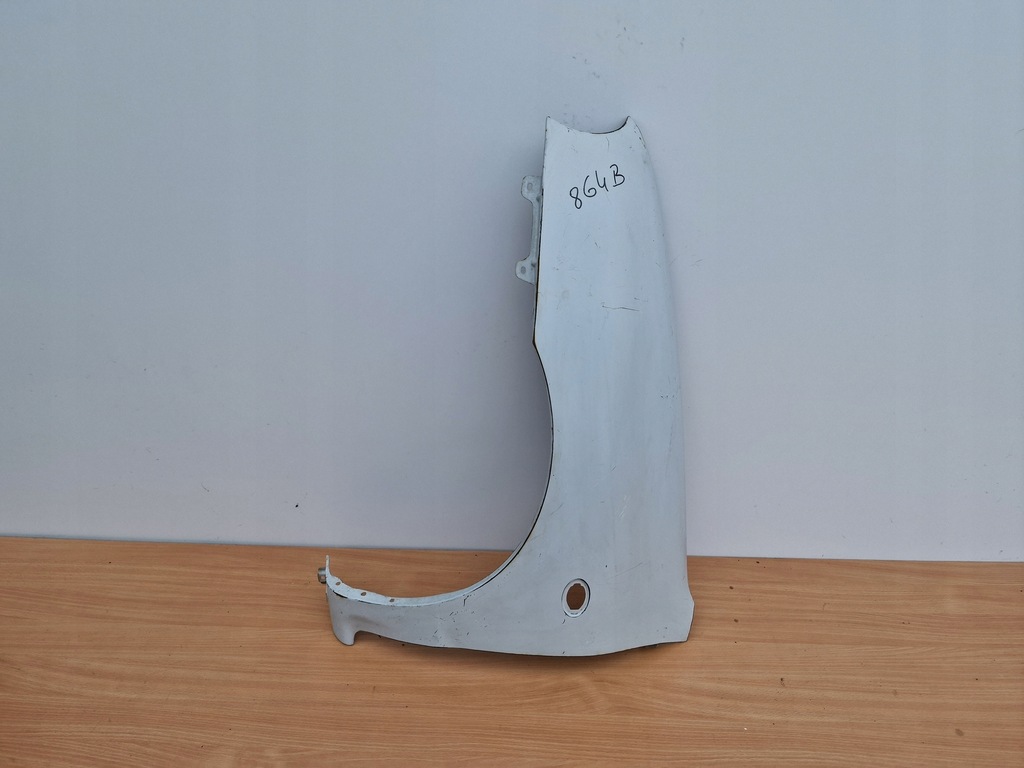 фото №1, Mazda 121 92-96 rok левый крыло перед оригинальный