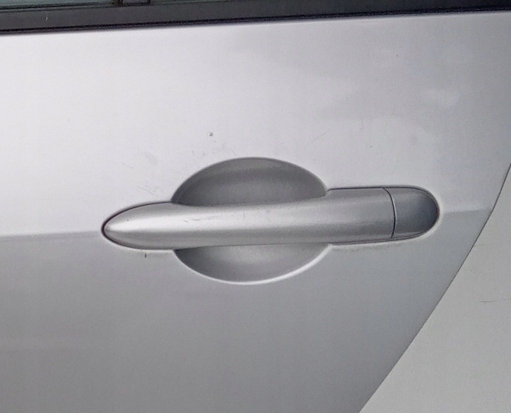 фото №1, Ручка двері ліва задня nissan primera p12 sedan