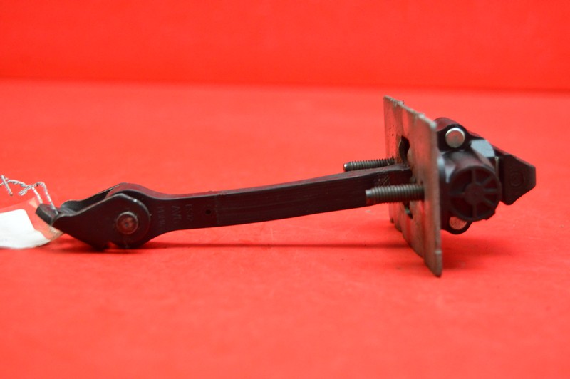 фото №6, Обмежувач двері лівий перед peugeot 301 15r