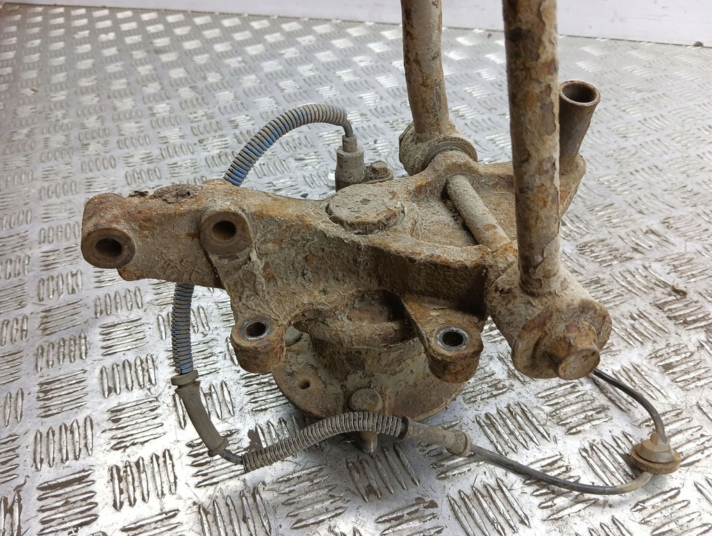 фото №7, Kia carens i 2006 задня сторона ліва ступиця колеса заднього