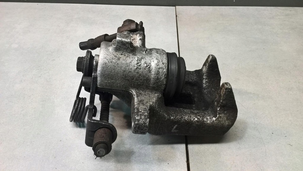 фото №5, Супорт гальмівний лівий задня audi a4 b6 2.5 tdi