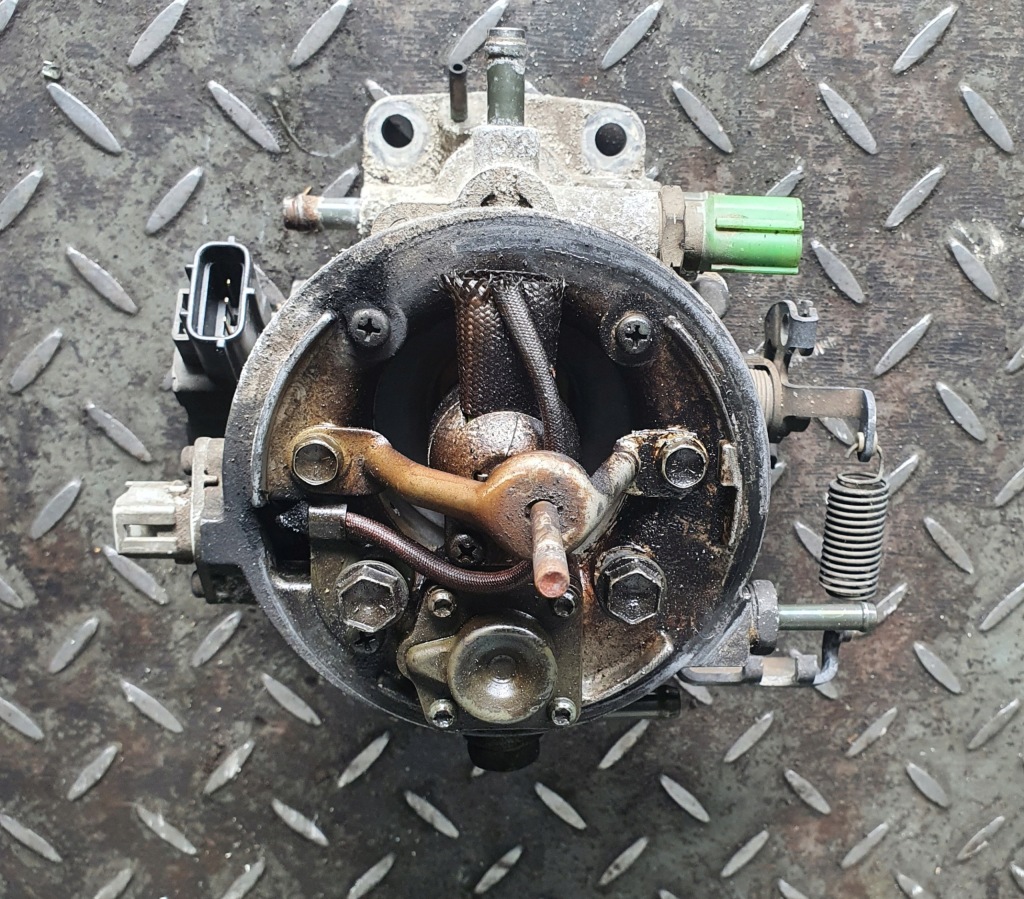 фото №1, Дросельна заслінка subaru justy 1.3 13400-63e60