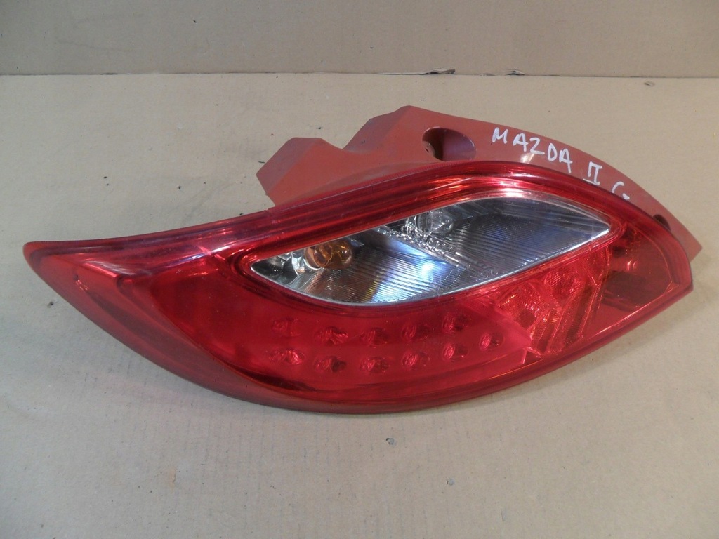 фото №1, Лампа левая задняя mazda 2 ii хэтчбек europa