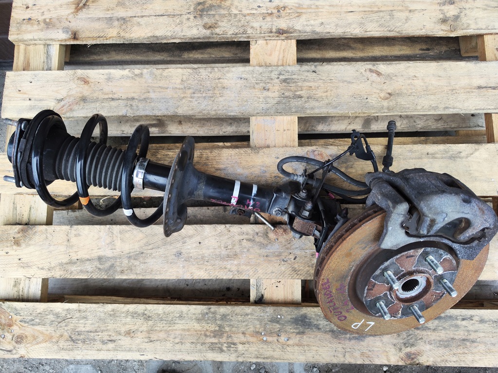 фото №1, Амортизаторна стійка поворотний кулак ліва outlander iii 2.4 b 2017