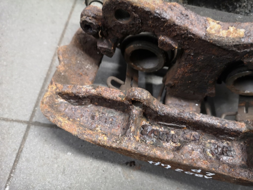 фото №12, Суппорт тормозной левый перед audi a8 d2 4.2 lift