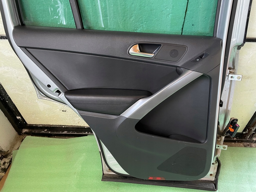 фото №1, Tiguan i обшивка двері лівий задня шкіра