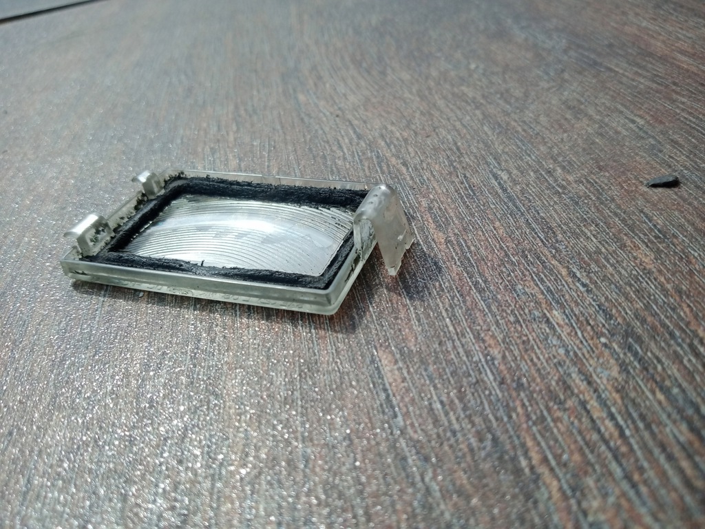 фото №7, Jeep grand cherokee wk 5-10 стекло подсветка номерного знака левая