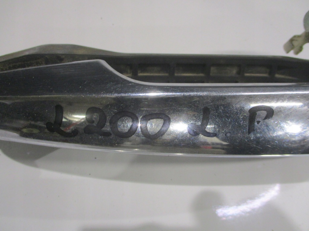 фото №4, Ручка дверь наружная левый перед l200 iv 06- хром