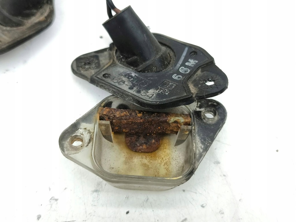 фото №10, Mazda xedos 6 1997 комплект лампа освітлення задній номерного знака реєстраційний