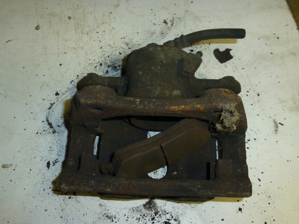 фото №4, Супорт гальмівний правий перед nissan micra k12