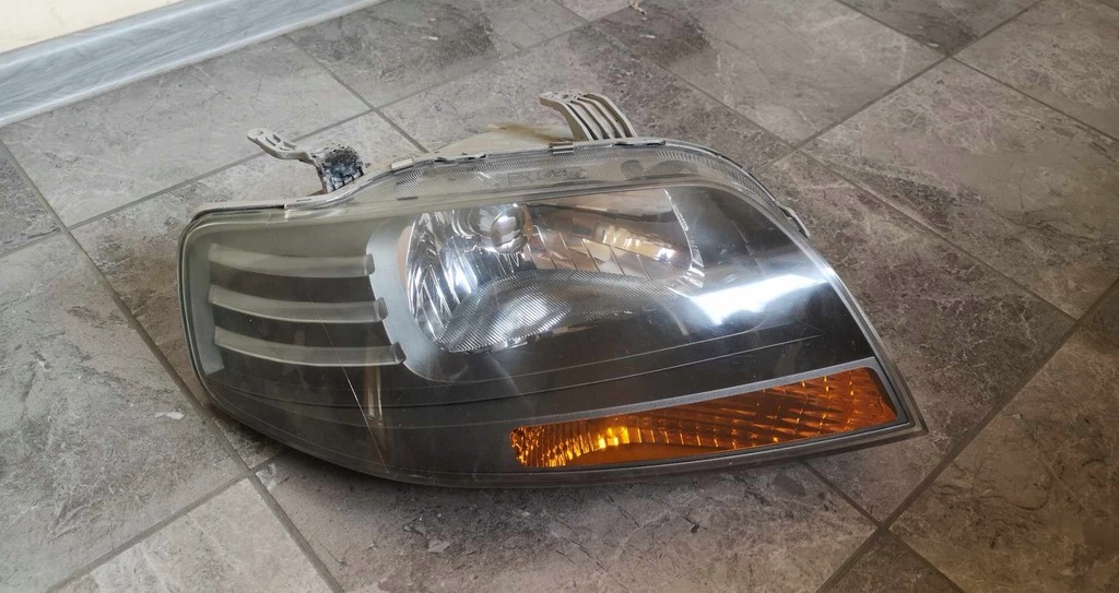 фото №1, Фара лампа права kalos aveo lift