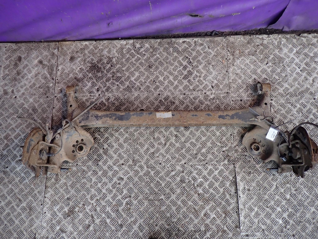 Купити Toyota yaris 1 99-05 вісь  задня балка задній гальмівні барабани abs