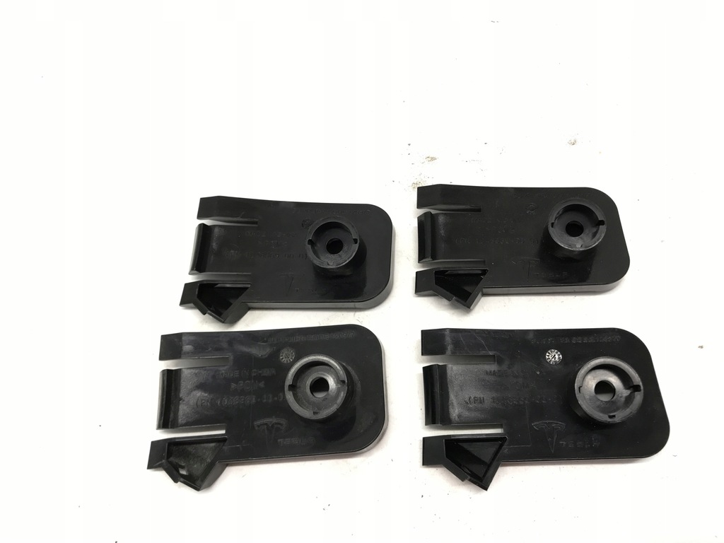 фото №1, Tesla 1046960-00-d кронштейн лампи передньої