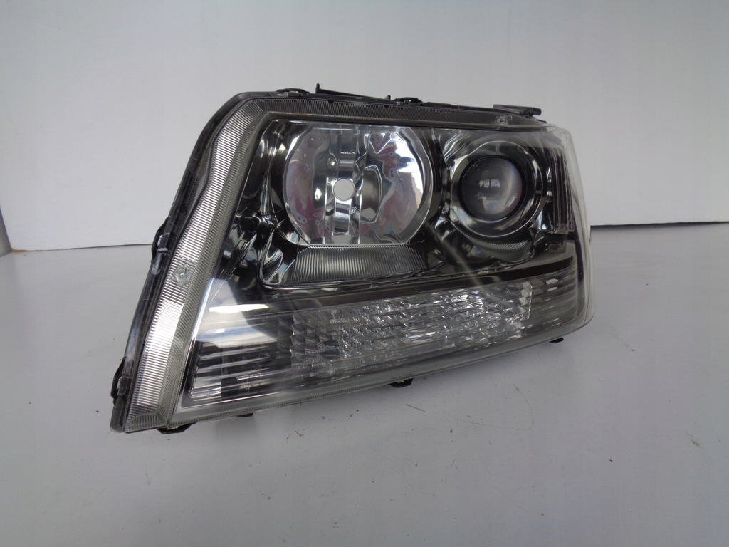 фото №1, Лампа левая фара suzuki grand vitara 05-