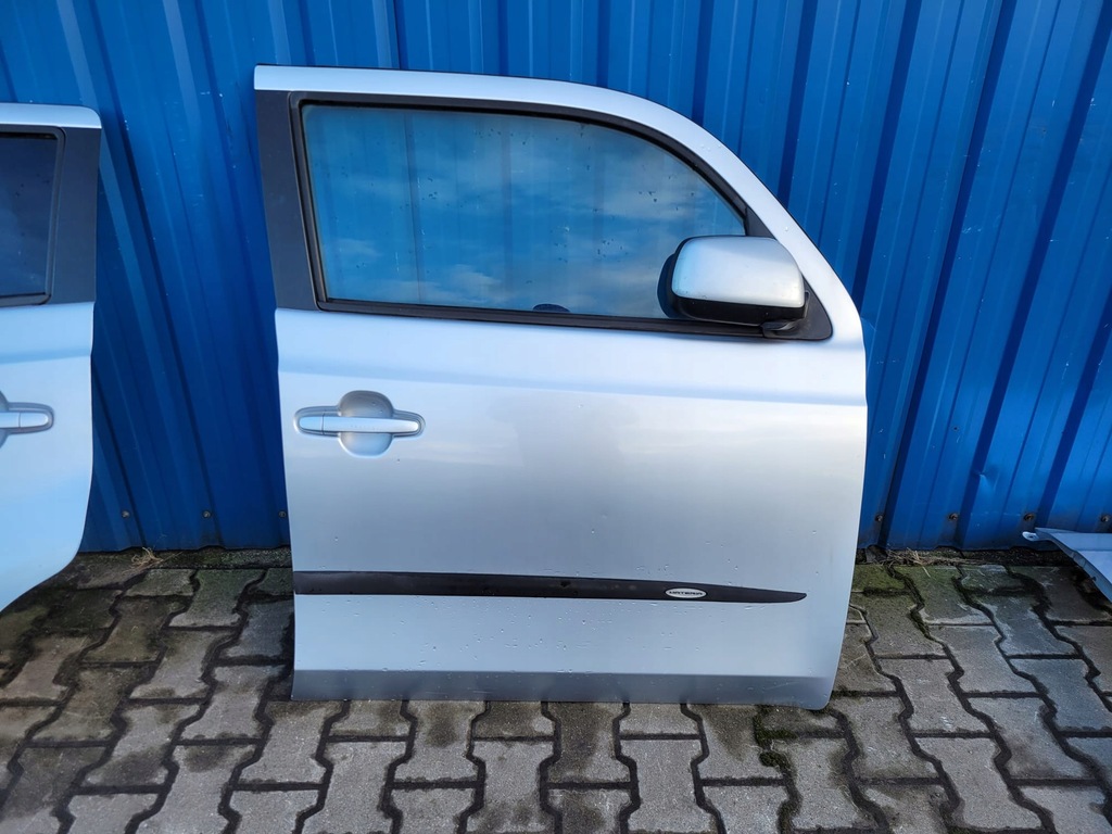 фото №1, Daihatsu materia двері праве передні сріблястий