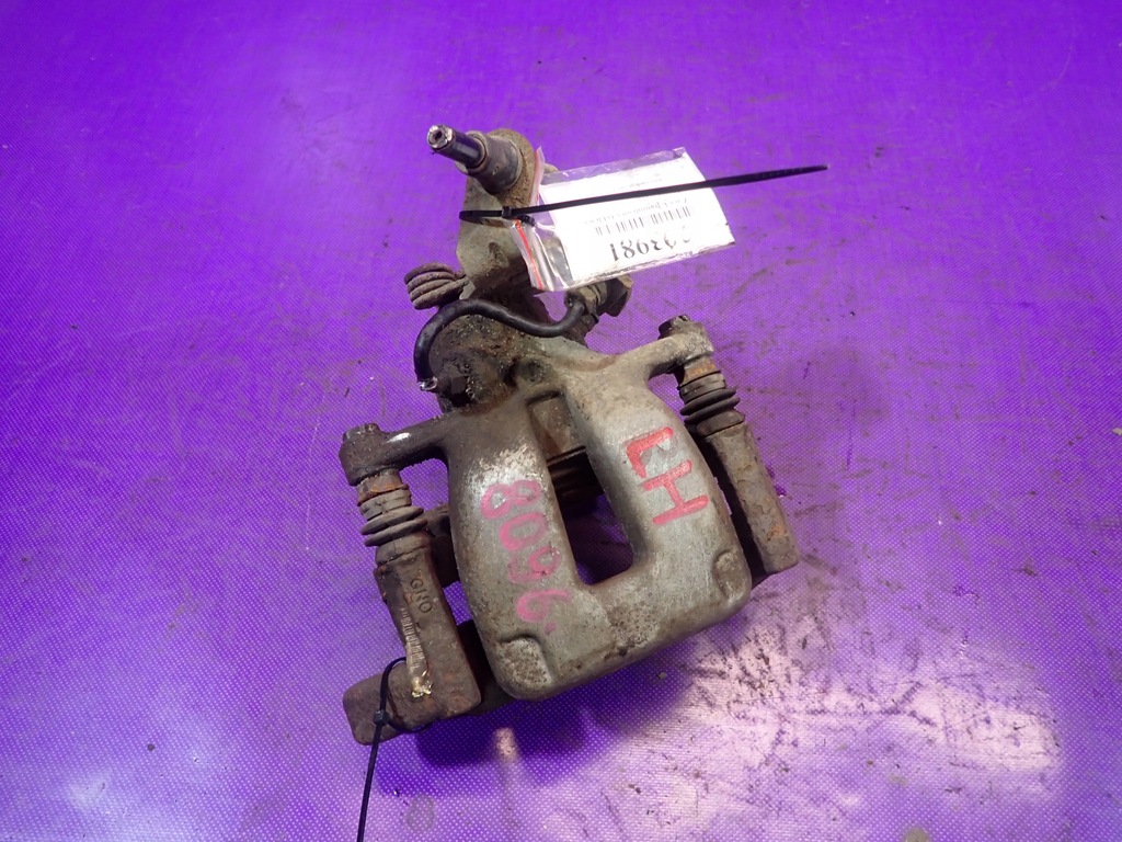 фото №1, Octavia ii hb 5d суппорт скоба тормозной задняя левый