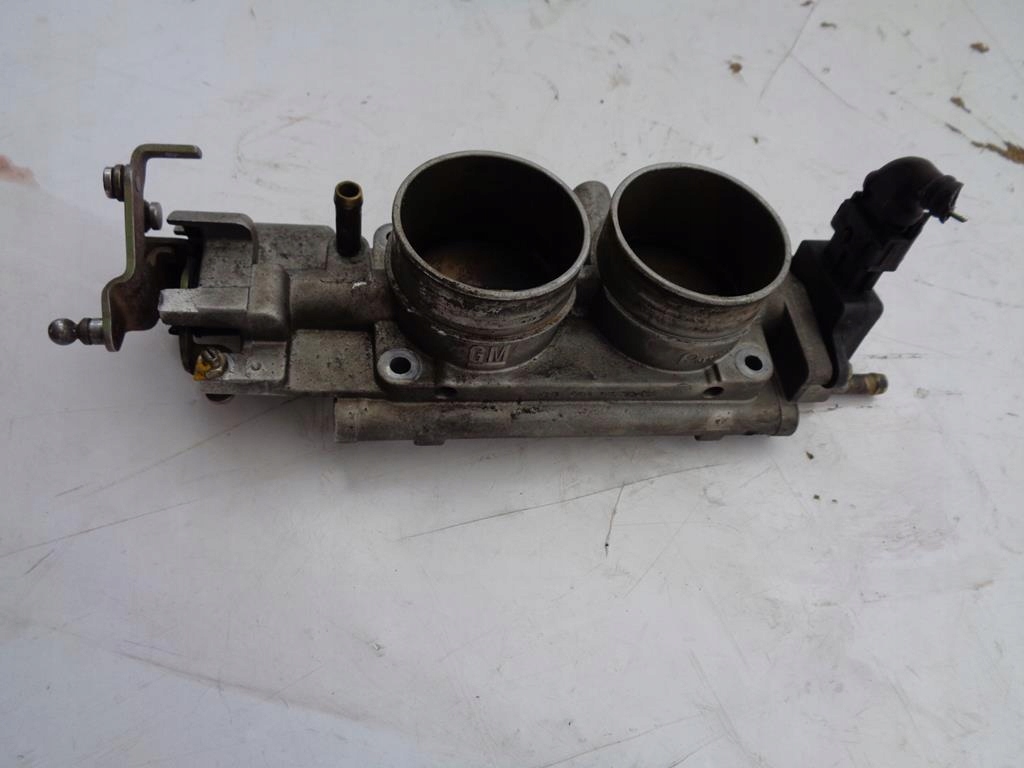 фото №1, Дросельна заслінка 90530438 opel omega b fl 2.5 v6