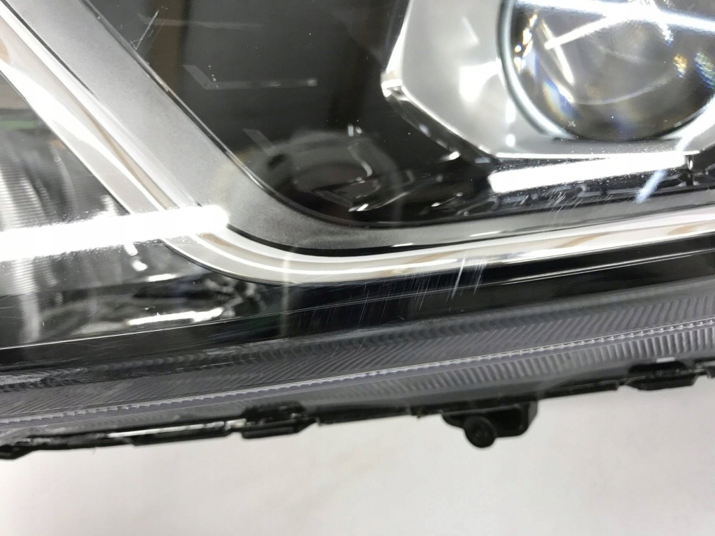 Ssangyong tivoli lift лампа ліва передня лінза + led zgm92-101030 в Україні