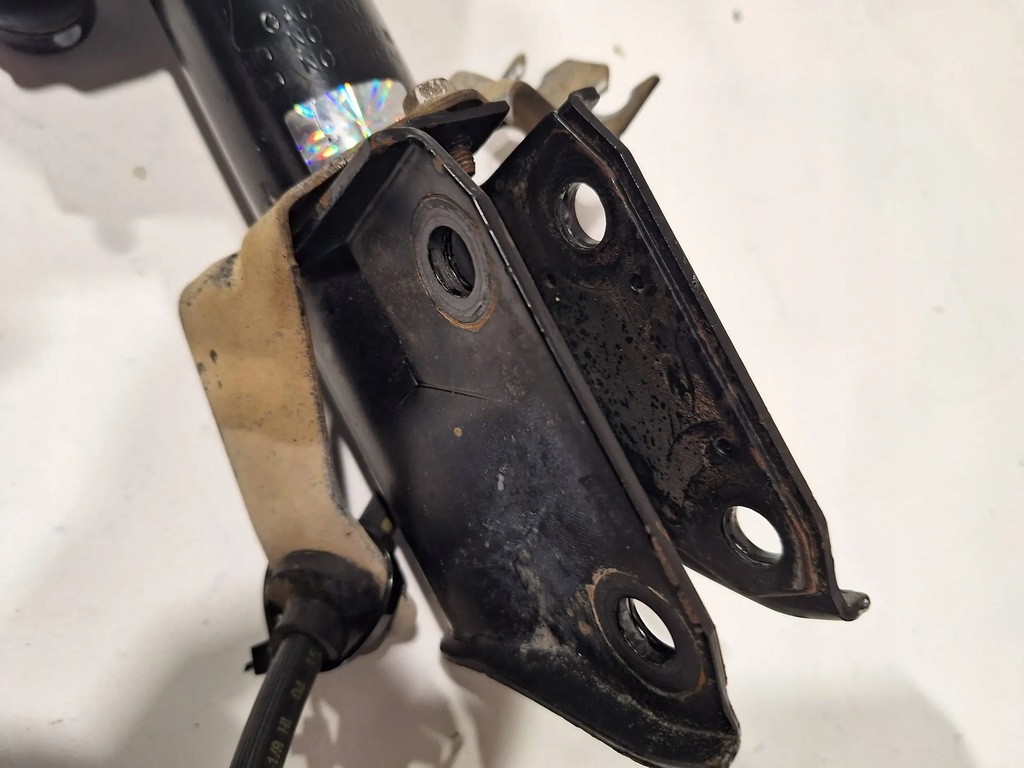 фото №7, Амортизатор перед лівий 614024jp dacia duster i lift 1.6 16v 4x4 15-