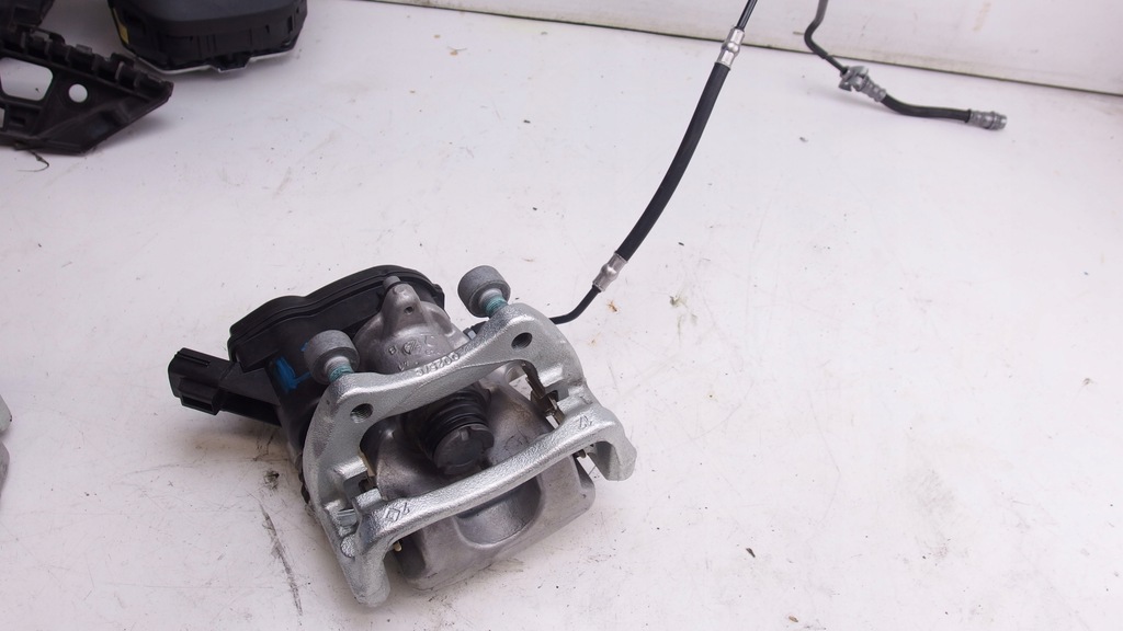 фото №1, Megane iv суппорт левый задняя электрический 260mm