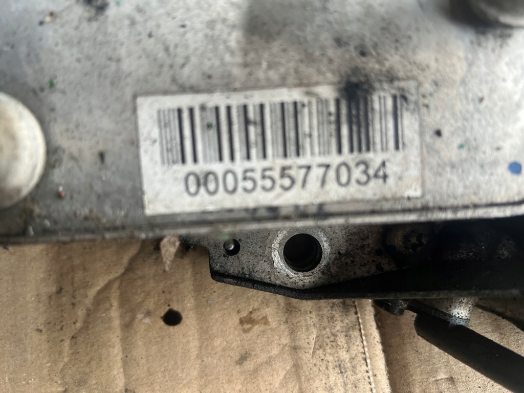 Opel astra j iv корпус фільтра оливи радіатор 55577034 в Україні