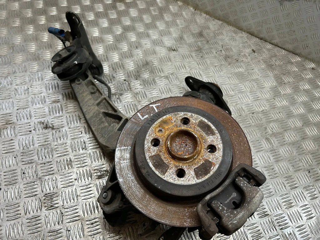 фото №1, Поворотний кулак амортизатор лівий задня mini r56 1.6t