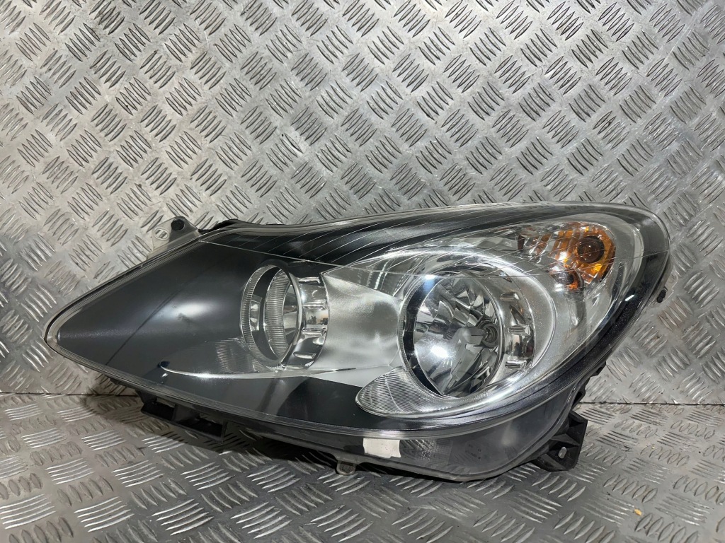 Купити Opel corsa d лампа ліва тонована європа 13217453