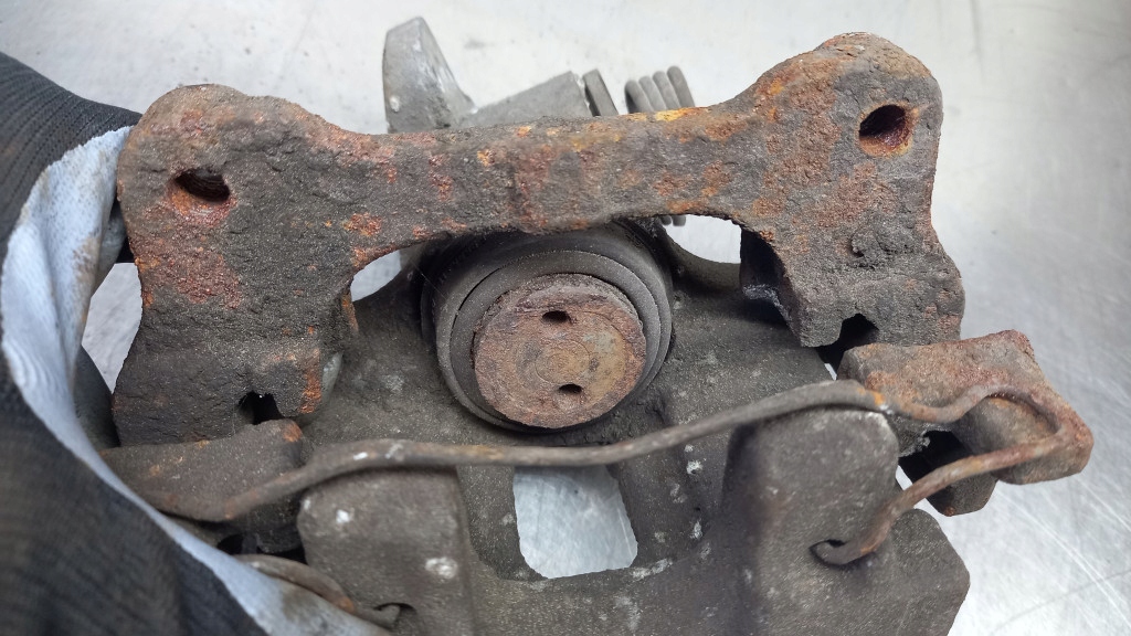 фото №5, Супорт гальмівний лівий задня nissan primera p12 04r 1.9d