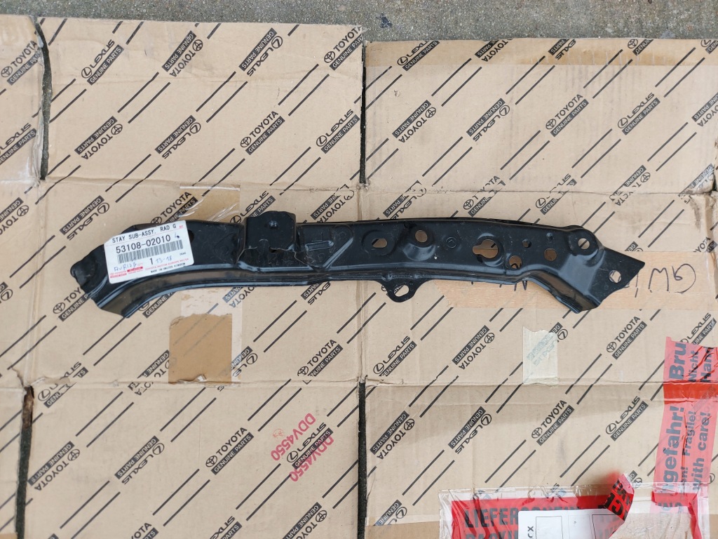 фото №1, Auris ii 13-18 панель фари l перед оригінал новий