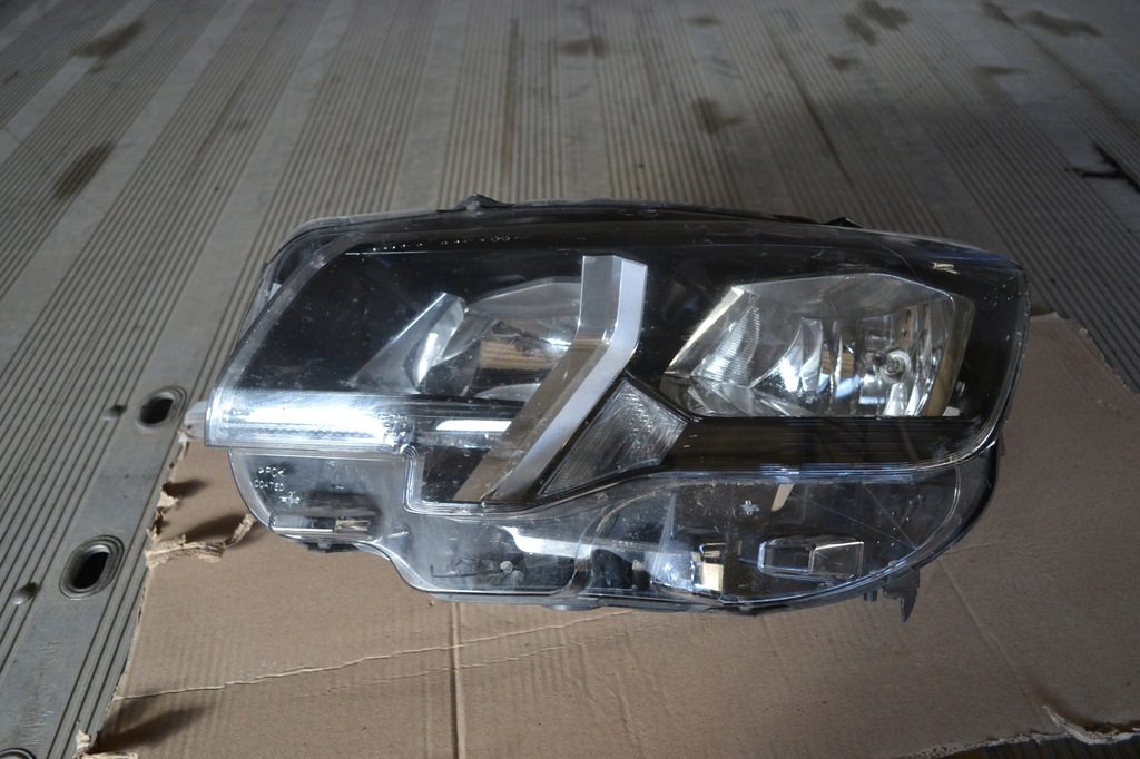 фото №1, Лампа левая фара левый перед partner iv rifter