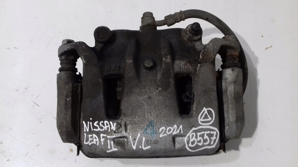 фото №1, Nissan leaf ii суппорт тормозной левый перед
