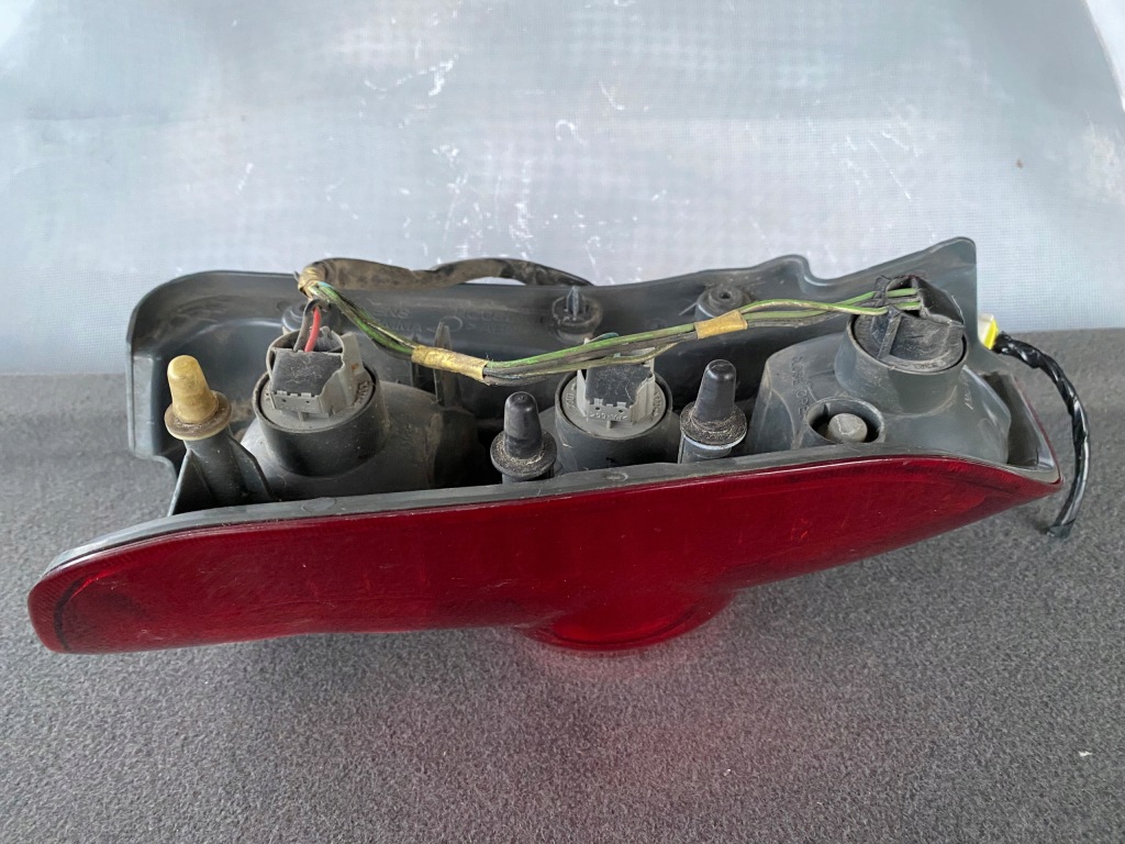 фото №13, Лампа левый задняя mitsubishi space star i lift + вкладыш - mr913173