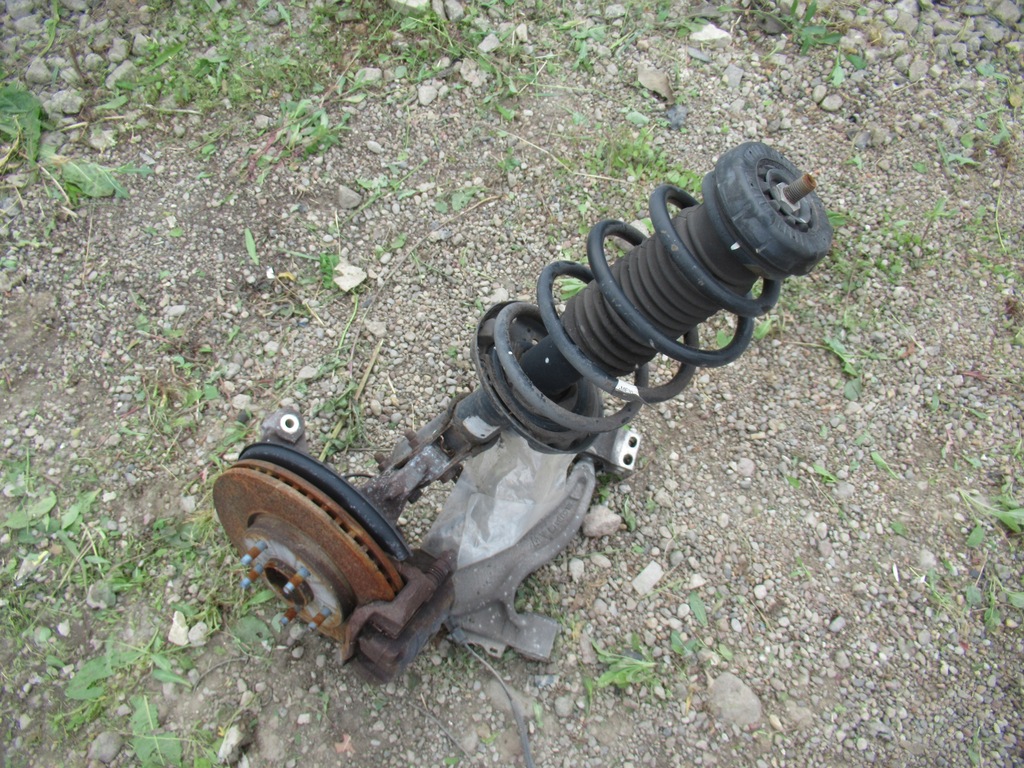 фото №1, Поворотный кулак амортизационная стойка левый orlando 2.0 163km