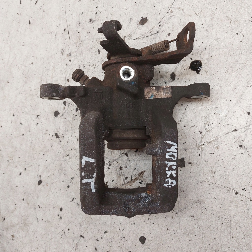 фото №1, Opel mokka a 1,6 суппорт тормозной левый задняя