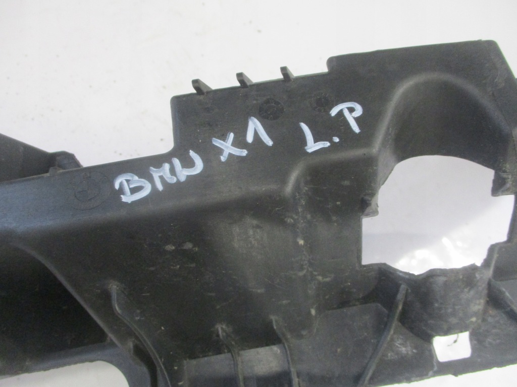 фото №13, Напрямна кронштейн лампи фара лівий перед x1 e84 2990179