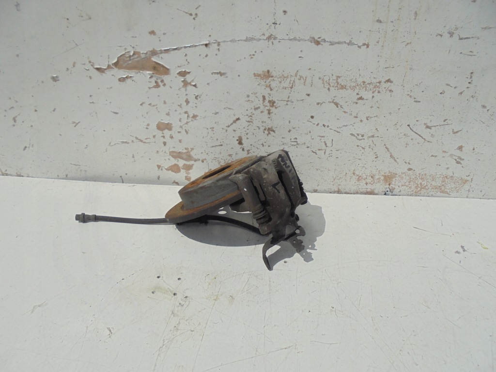 фото №1, Супорт гальмівний лівий задня mini cooper r56