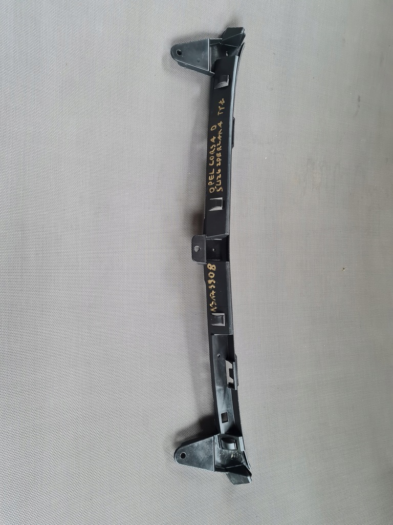 фото №10, Opel corsa d напрямна бампера задня середній 13179908