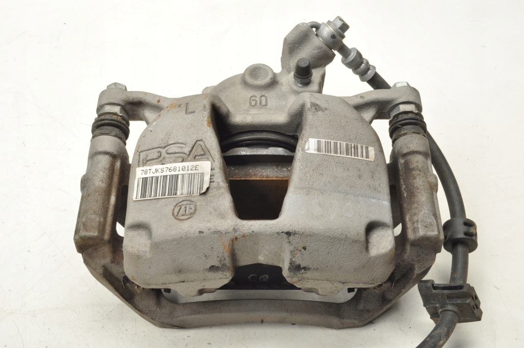 Peugeot rifter супорт гальмівний ліве перед Доставка