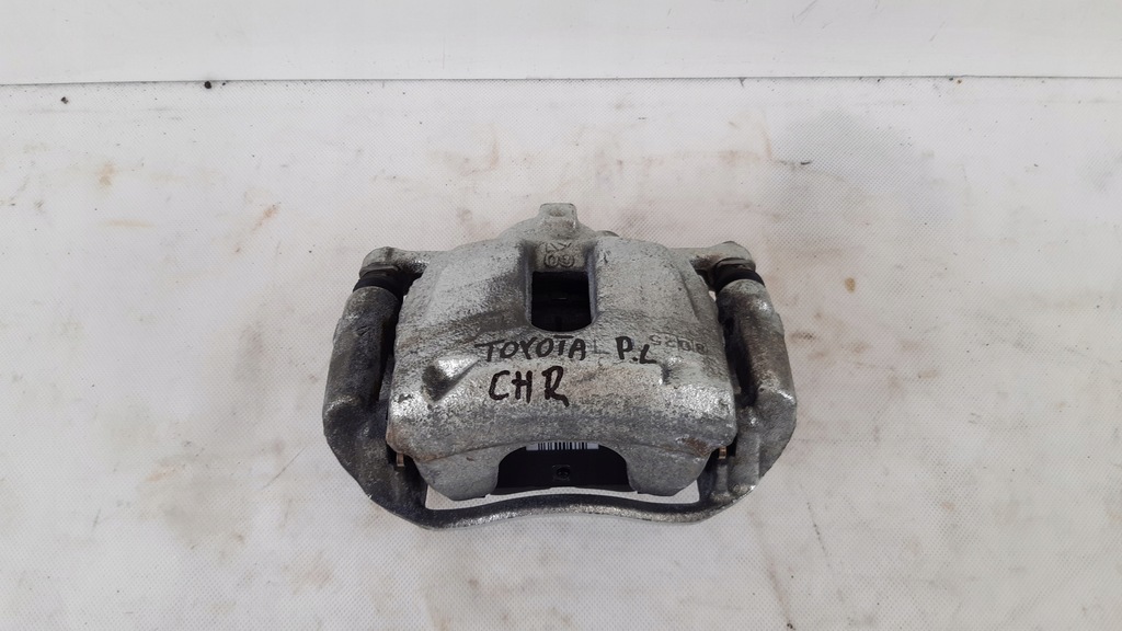 фото №1, Toyota c-hr суппорт тормоза левый перед