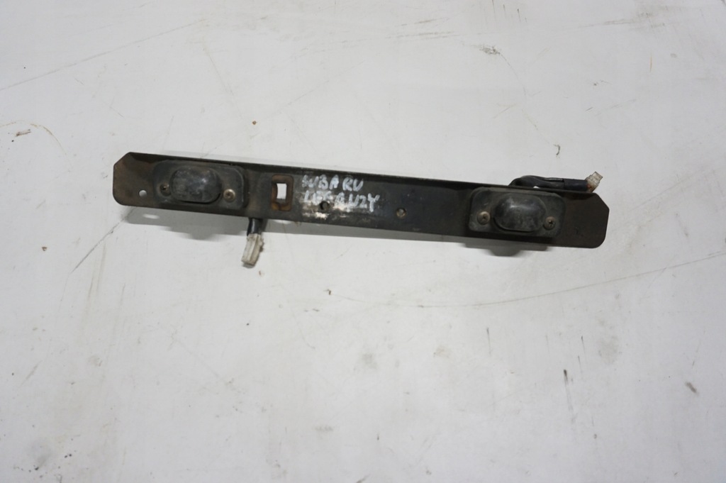 фото №1, Молдинг освітлення номерного знака subaru legacy