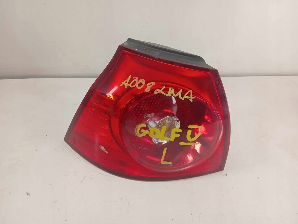 фото №1, Лампа левая задняя vw golf v 03-09