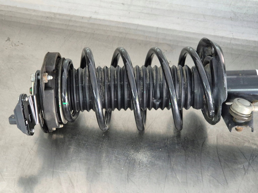 фото №12, Vw eos амортизатор передний правый поворотный кулак mcperson 3c0413031d