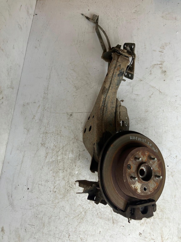 фото №1, Поворотний кулак лівий задня koleos 2.0 dci 4x4